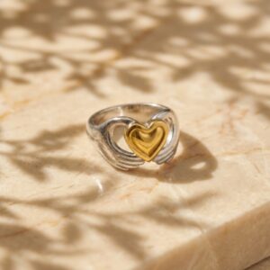 CARRYING HEART RING