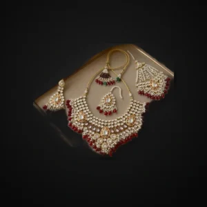 TRADITIONAL KUNDAN STYLE BRIDAL SET WITH MAROON STONES